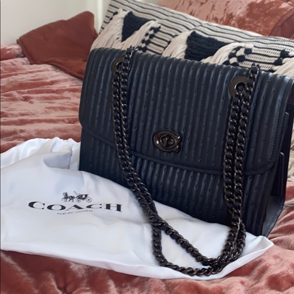 Coach Parker quilted with small rivets